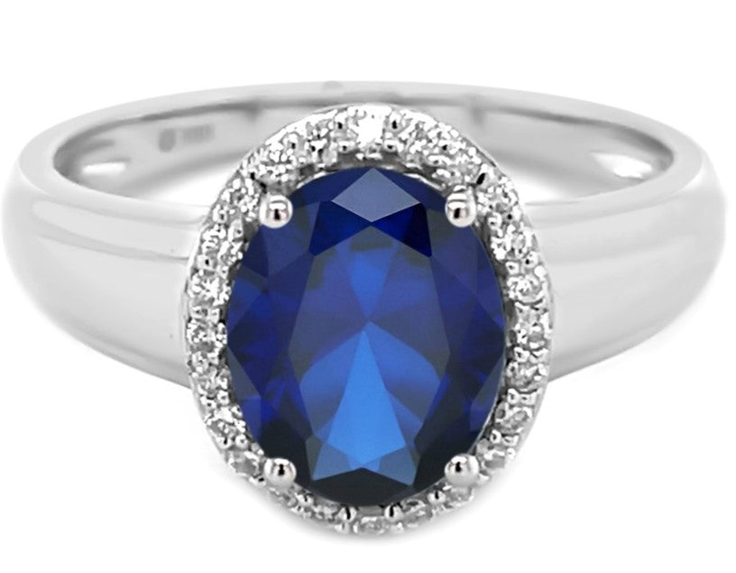 Real Big Sapphire and Simulated Diamond Ring