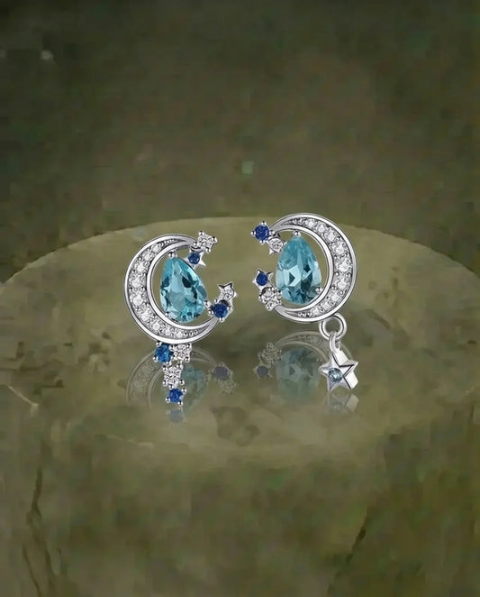 Aretes de topacio real y zafiro elaborado