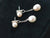 Pendientes doble perla blanca