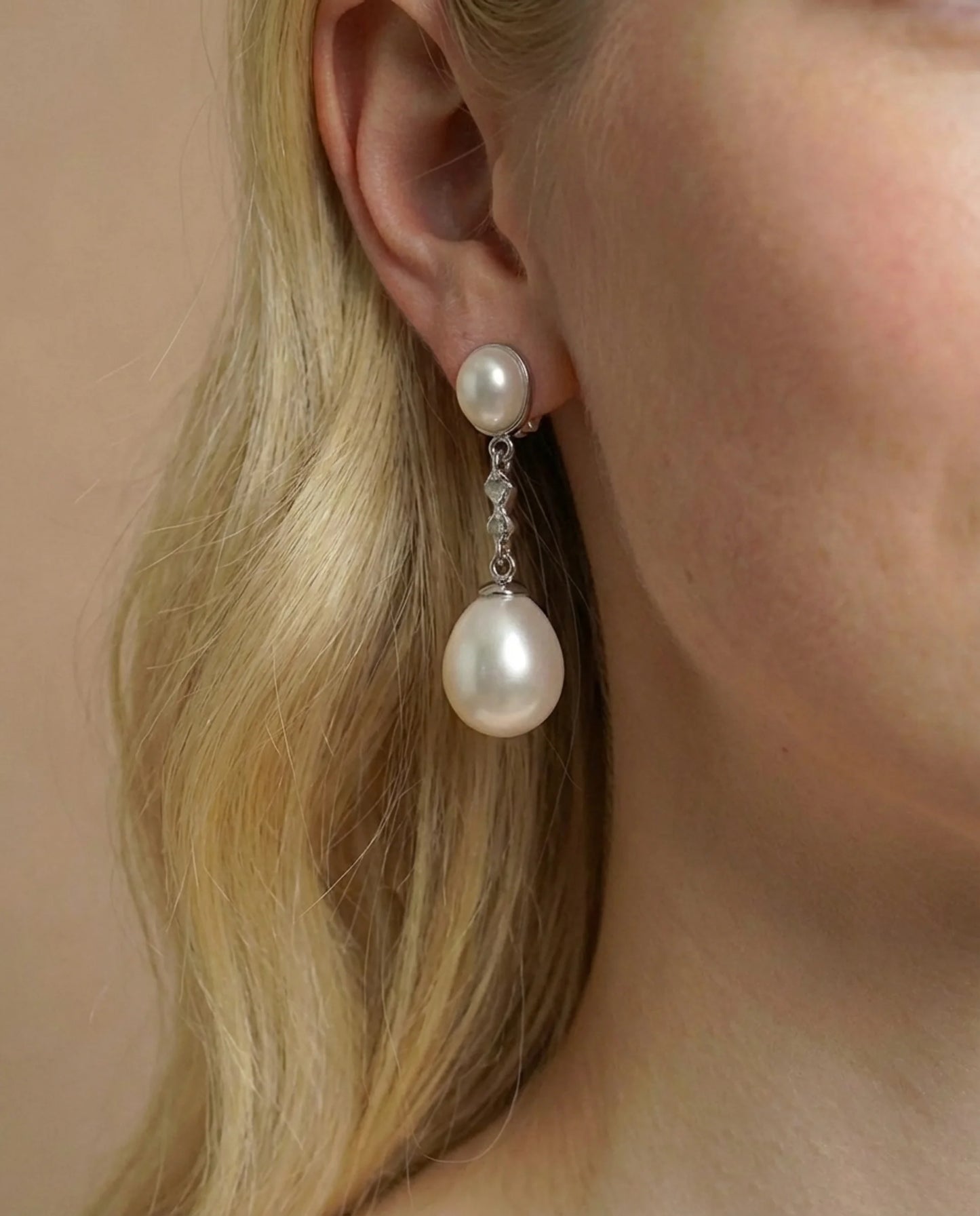 Norsunluu kaksi helmikorvakorua