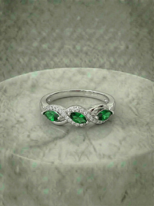 Trilogy made Emerald Ring