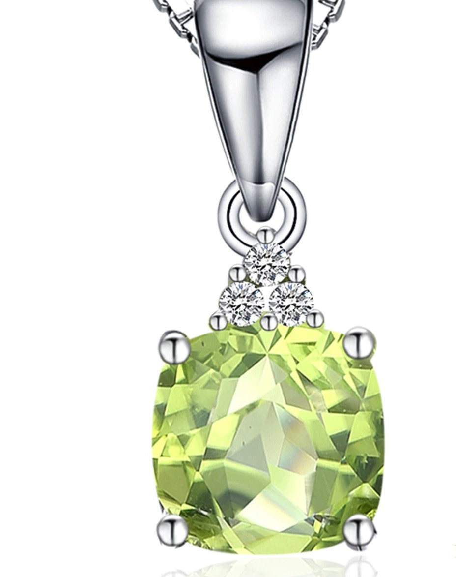 Real Peridot Pendant with simulated Diamonds