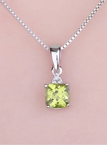 Real Peridot Pendant with simulated Diamonds